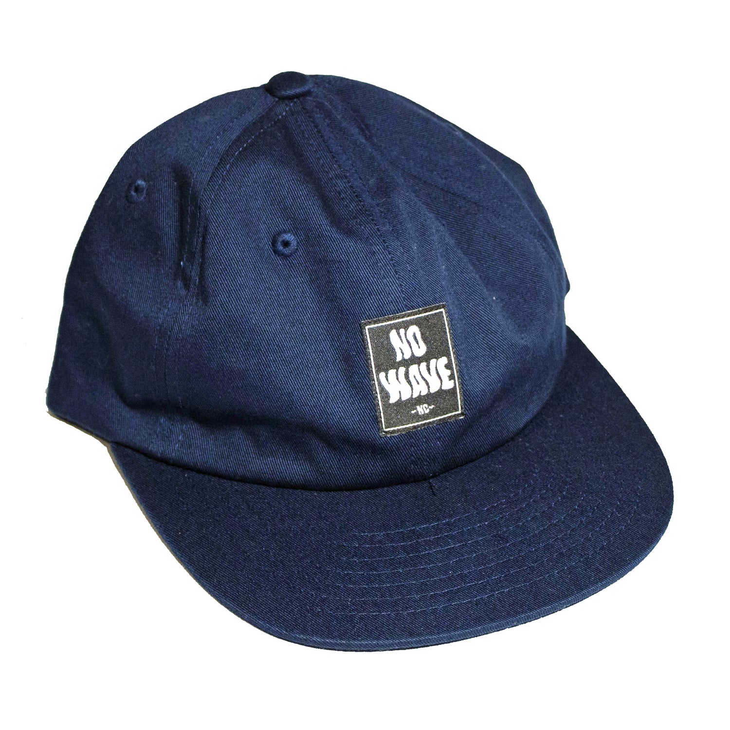 The 'FLIPPER' Hat, in Navy Blue, from No Wave NC is an all-time classic for all occasions. Wear it on the way to you surf session, to skate, to fish, or wear it to chill on the beach. This hat will keep you stylish and lookin good everyday! 